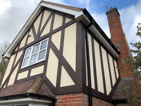 tudor boarding|tudor wood paneling exterior.